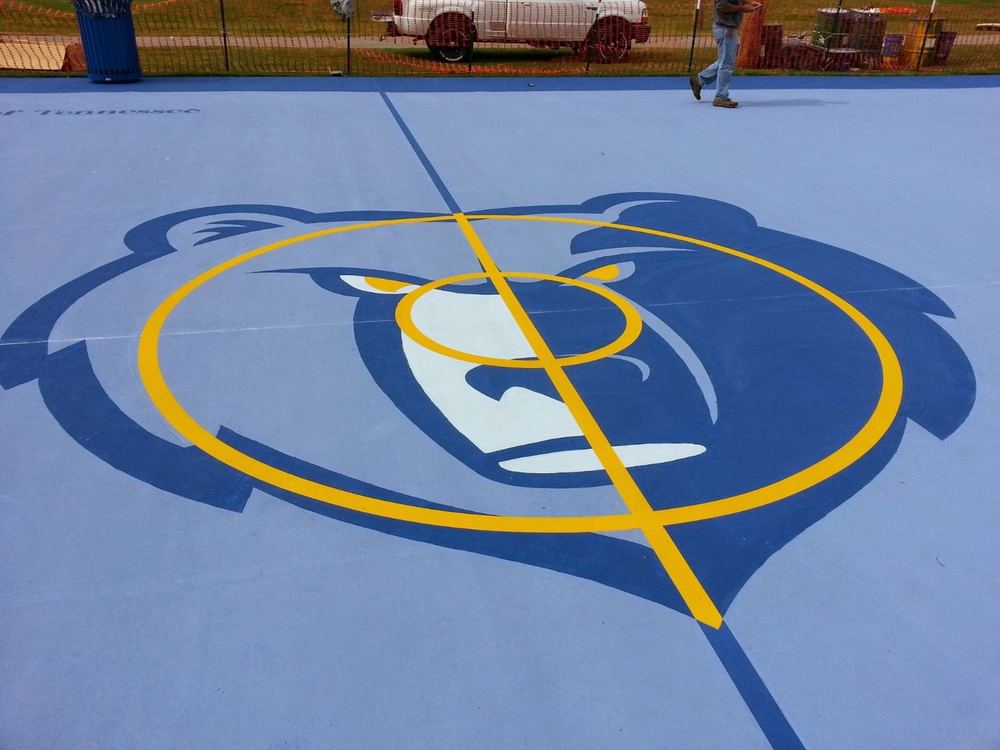 Court painted with a large custom bear logo at center